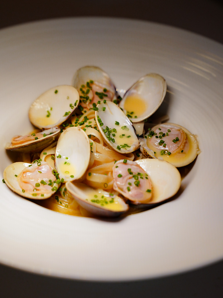 Buttery sauce and giant clams! Photo: Evan Mua/HungryGoWhere revolution wine bistro