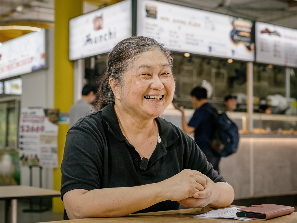 She first started as a part-timer, but is now in charge of training the staff. Photo: Ravin Thiruchelvam/HungryGoWhere min jiang kueh munchi