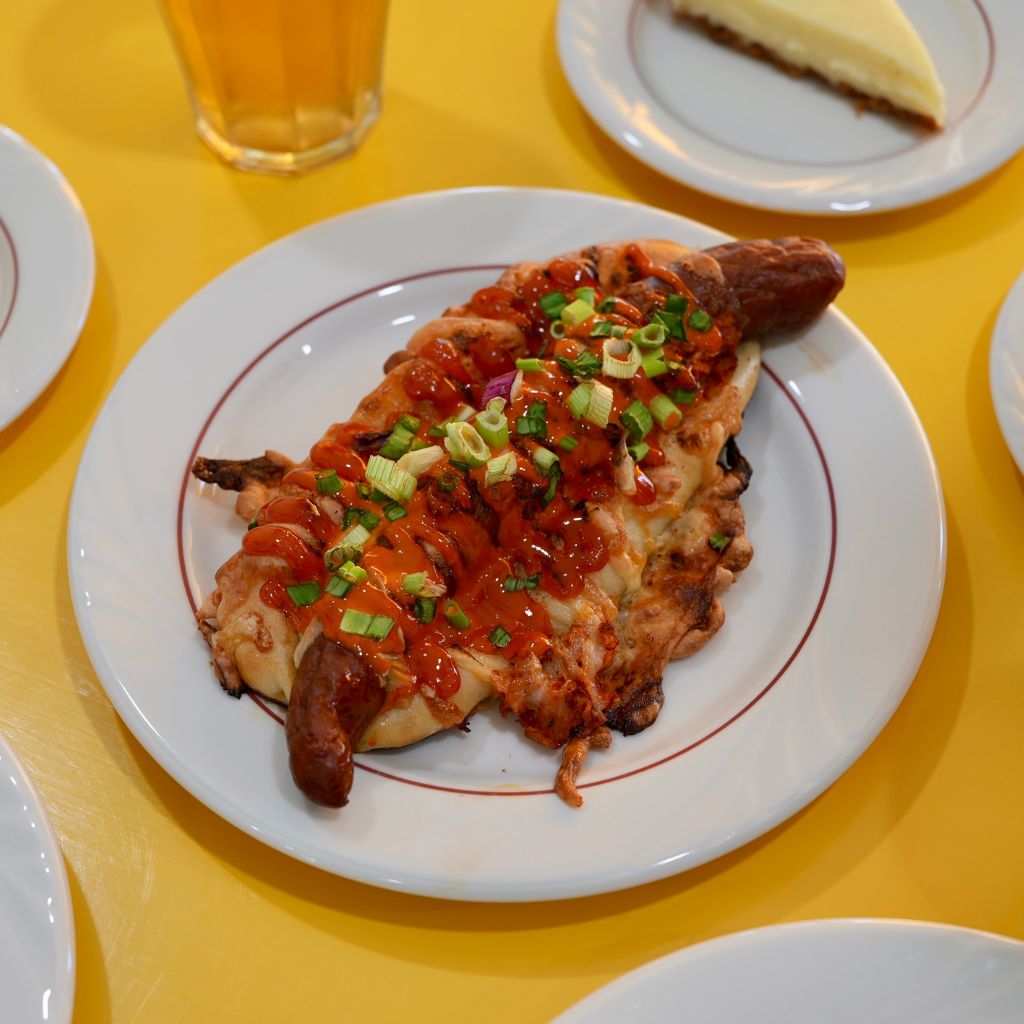 An average sausage bun, but zhng-up (upgraded). Photo: Shannon Yap/HungryGoWhere the weirdoughs
