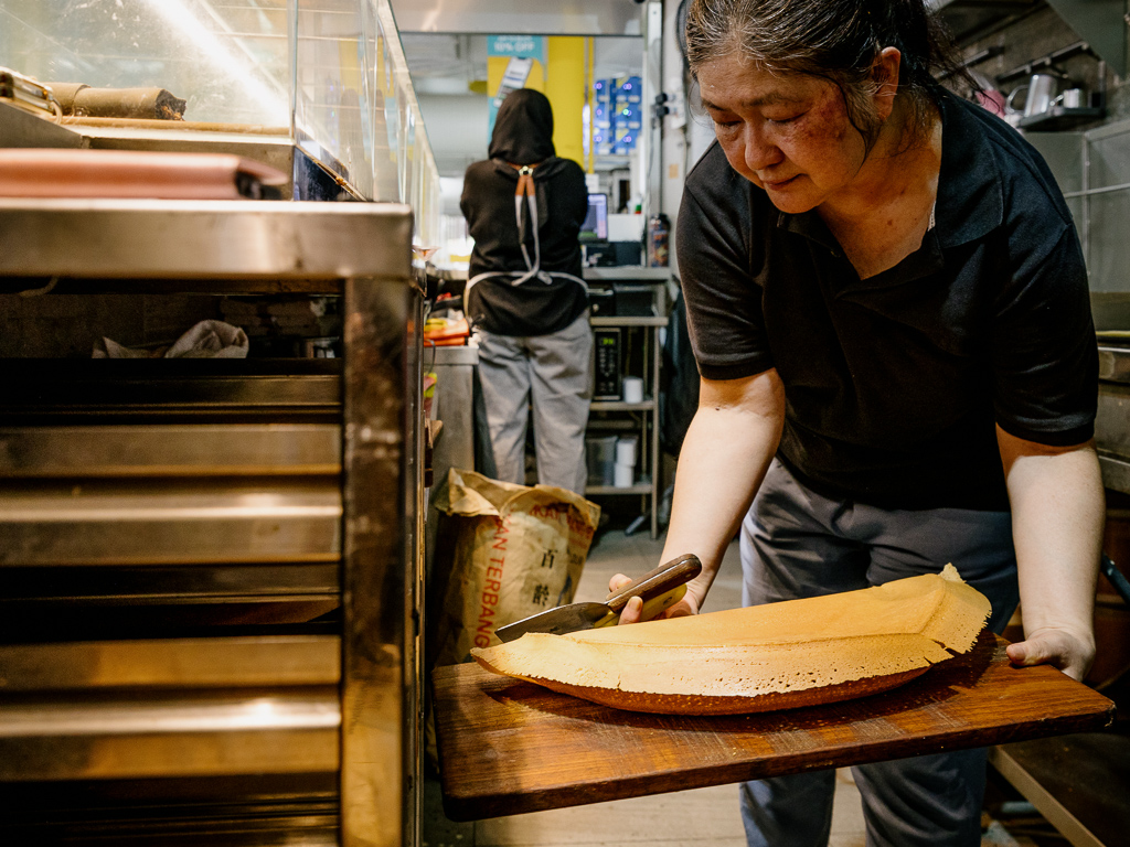 The huge pancake is folded in half after the filling is added. Photo: Ravin Thiruchelvam/HungryGoWhere min jiang kueh