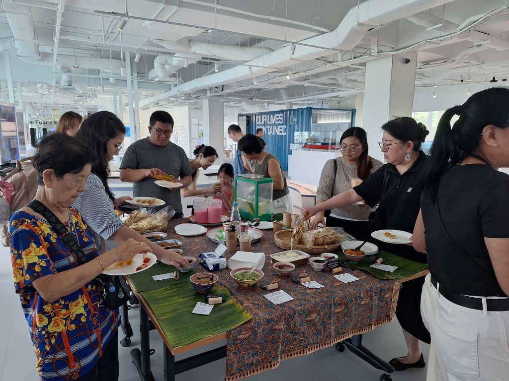 Participants having a go at identifying items on the food trail. Photo: Museum of Food/Instagram SG Culture Pass Food Activities