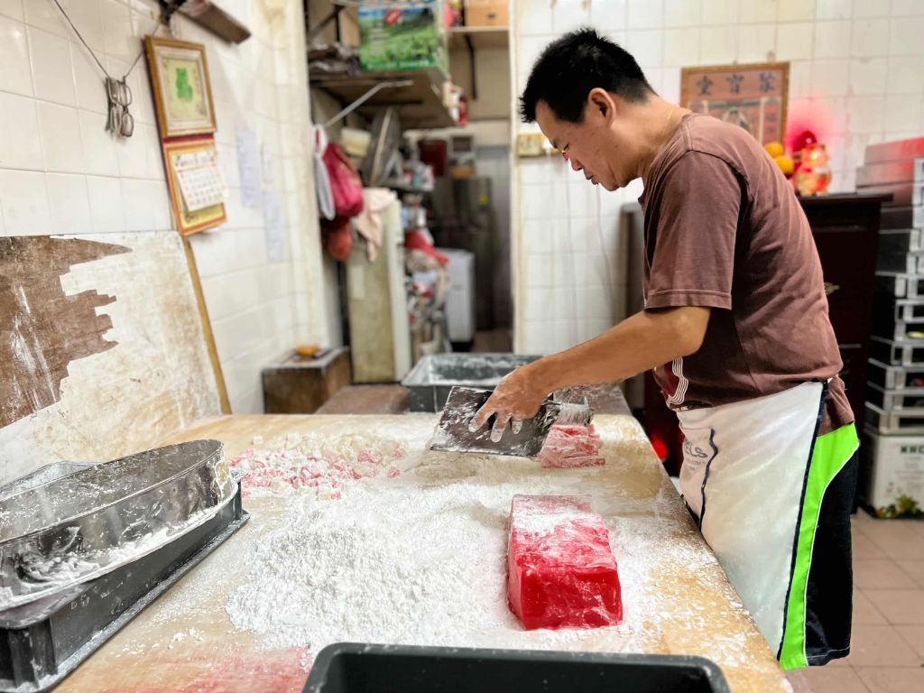 A peek at how ang ku kueh is made. Photo: HeyLadTour/Instagram SG Culture Pass Food Activities