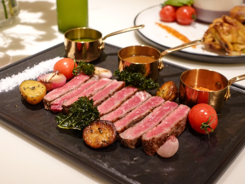 Wagyu steak with a trio of sauces. Photo: Sarah Chua/HungryGoWhere Tomacado Singapore Floral Themed Paragon