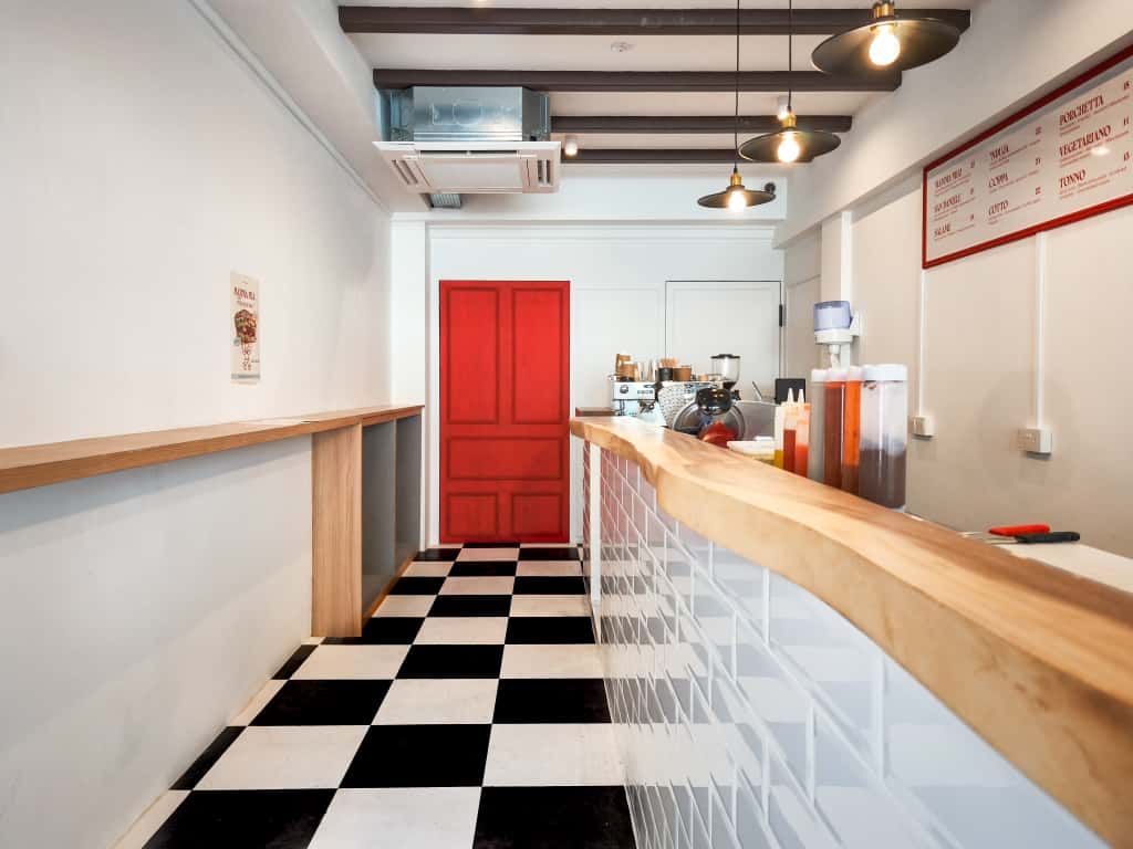 Behind the red door lies another concept, named The Champagnery. Photo: Mamma Mia Focaccia Mamma Mia Focaccia Amoy