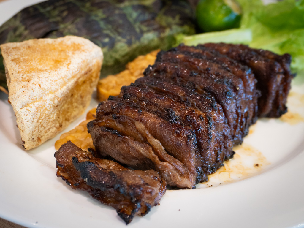 The babi bakar you won’t stop thinking about. Photo: Angeline Ang/HungryGoWhere on embers chef x