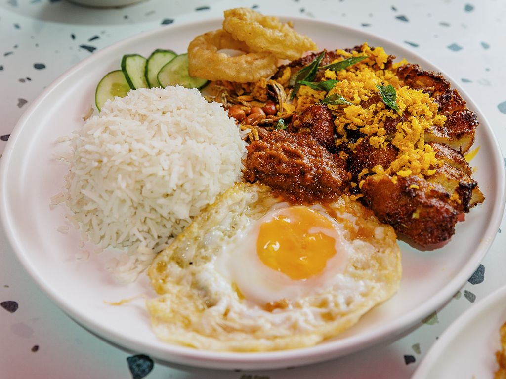 Heartland by Enjoy’s pork belly berempah nasi lemak. Photo: Ravin Thiruchelvam/HungryGoWhere Heartland by Enjoy