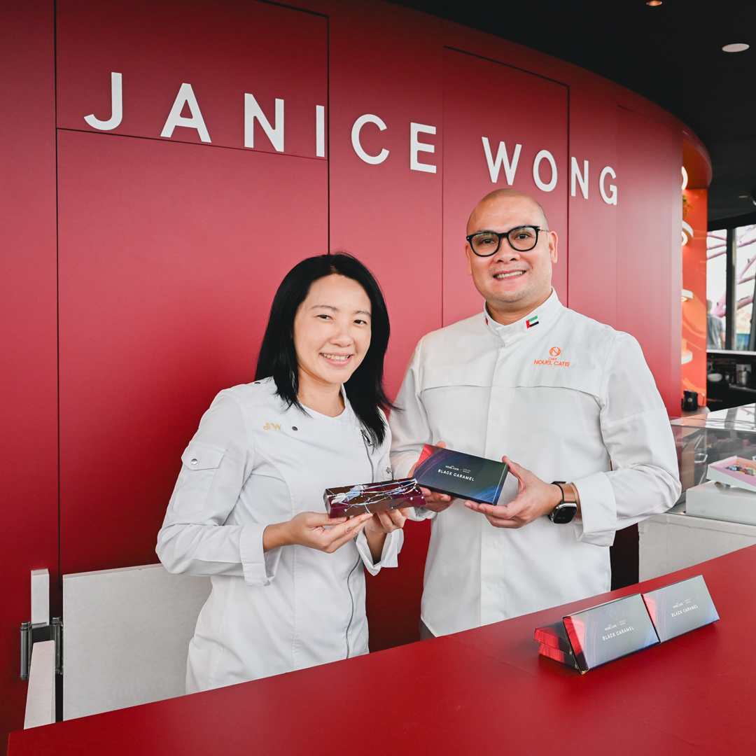 Janice Wong (left) and Nouel Catis (right) with their latest creation. Photo: Abdul Rahim Anwar/HungryGoWhere singapore dubai chocolate