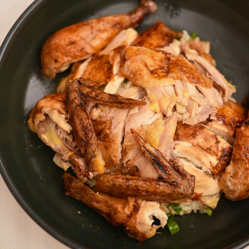 Oven-baked chicken…? Quite an interesting variation. Photo: Shannon Yap/HungryGoWhere Tiong Bahru Hainanese Boneless Chicken Rice Takashimaya
