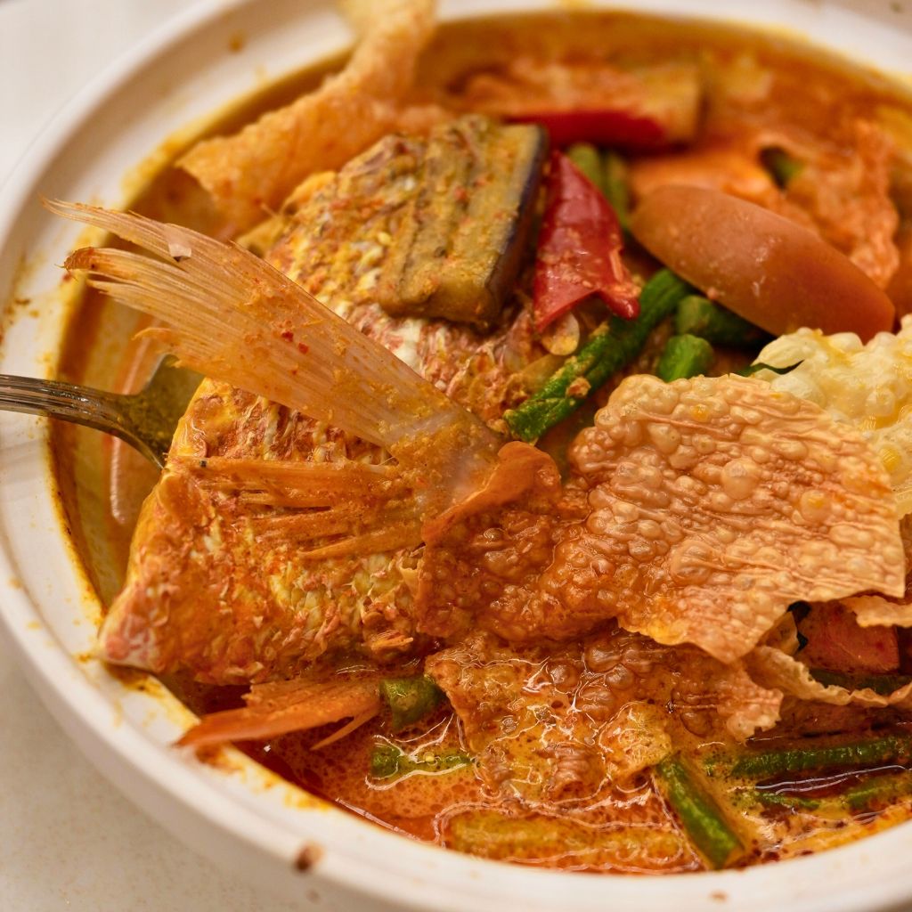 This classic curry dish needs little introduction. Photo: Shannon Yap/HungryGoWhere Tiong Bahru Hainanese Boneless Chicken Rice Takashimaya