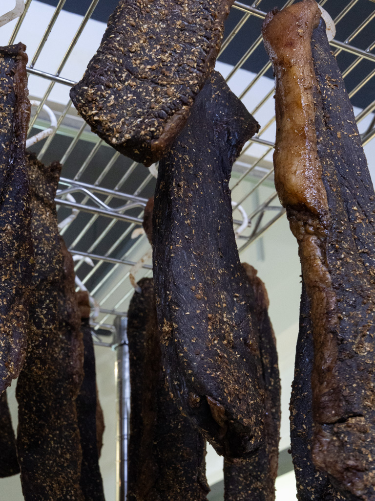 The meats are progressively moved to the top of the racks during the curing process. Photo: Angeline Ang/HungryGoWhere baggies joo chiat
