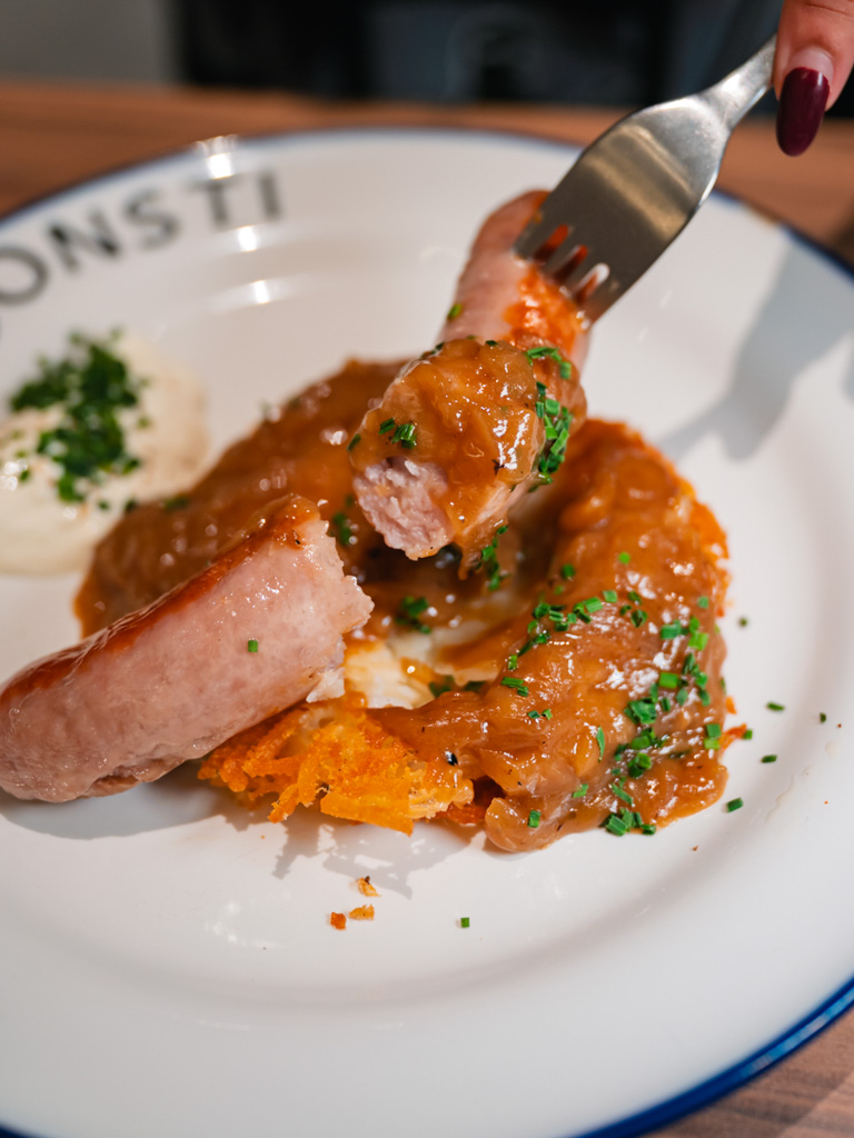 The onion gravy lent the dish a rich, saucy depth. Photo: Abdul Rahim Anwar/HungryGoWhere poonsti nus