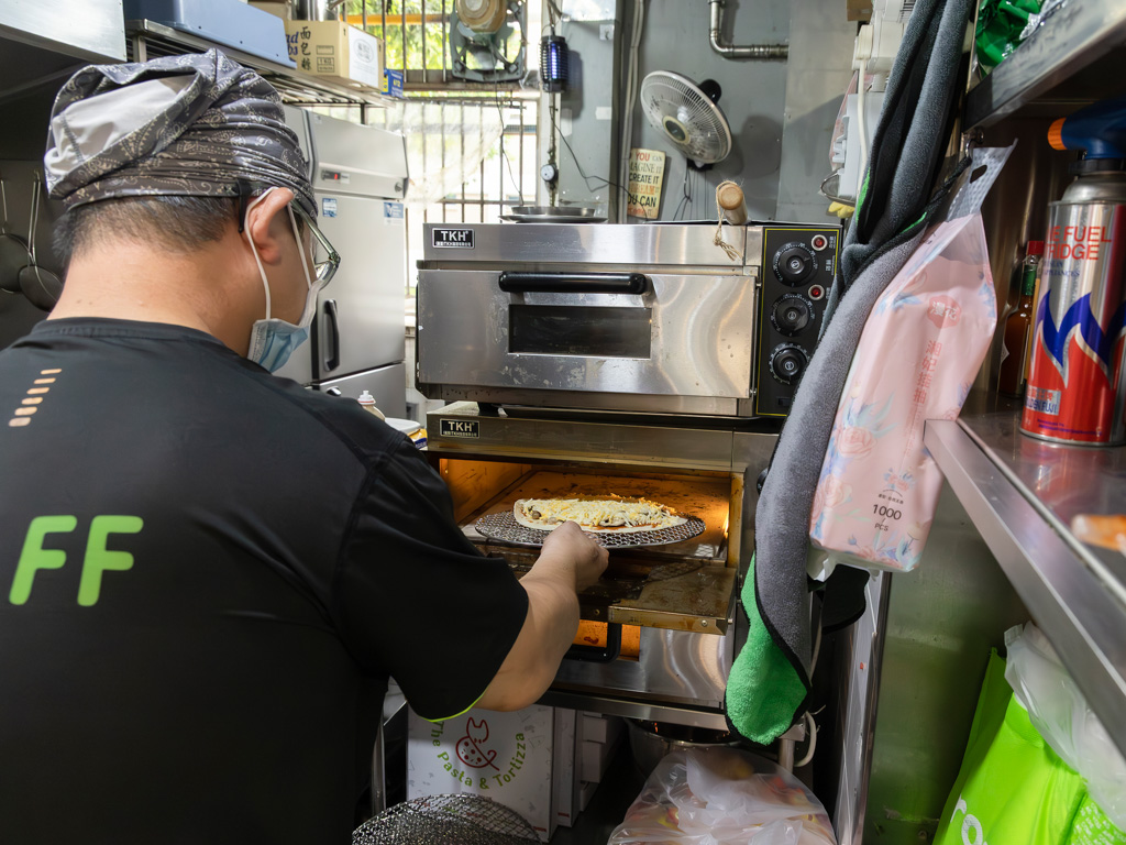 Tortizzas are baked in a pizza oven with a ceramic stone plate. Photo: Koh Mui Fong/HungryGoWhere the pasta & tortizza hougang