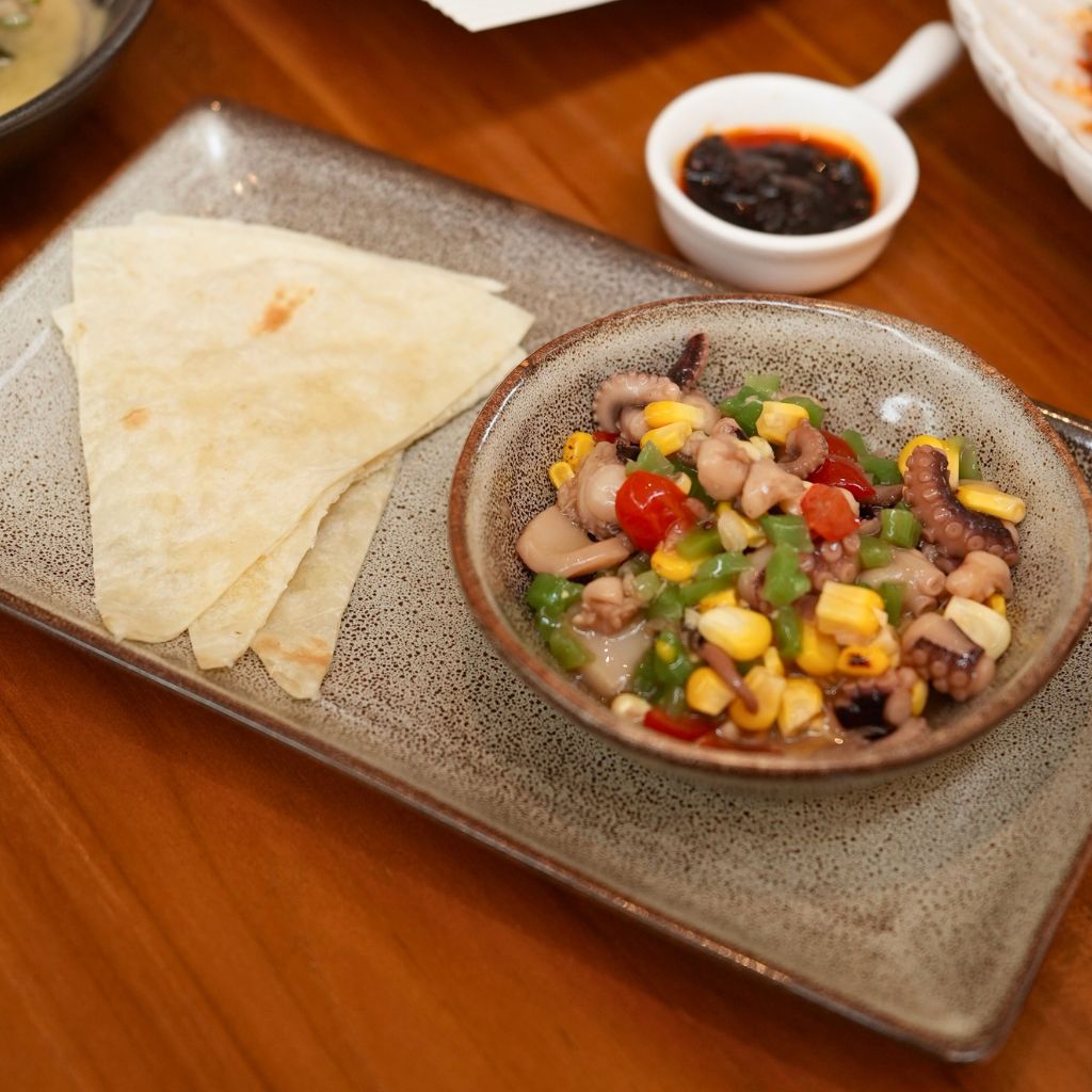 The tako wasabi with tortilla didn’t quite hit the spot for us. Photo: Shannon Yap/HungryGoWhere van kafe jurong