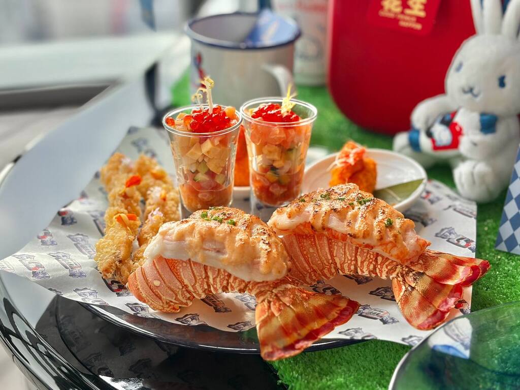 Baked lobster and fried fritters. Photo: Shannon Ong/HungryGoWhere westin white rabbit afternoon tea