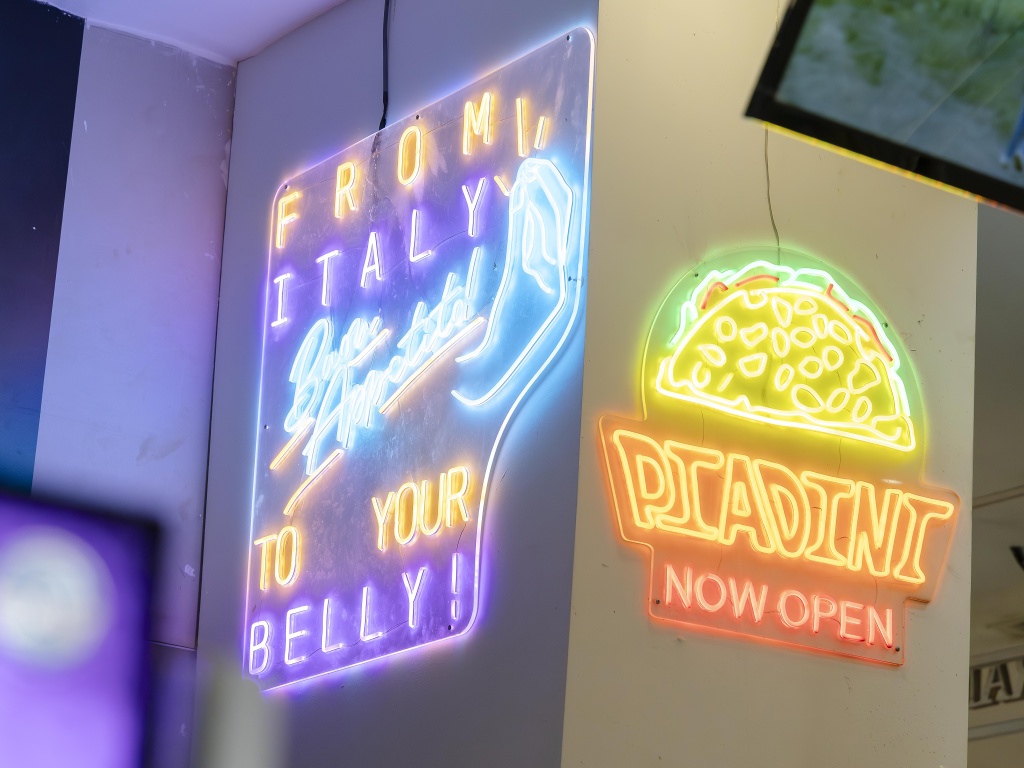 If you can’t find the stall, try looking for its bright neon signs. Photo: Koh Mui Fong/HungryGoWhere piadini italian streats somerset piadina singapore