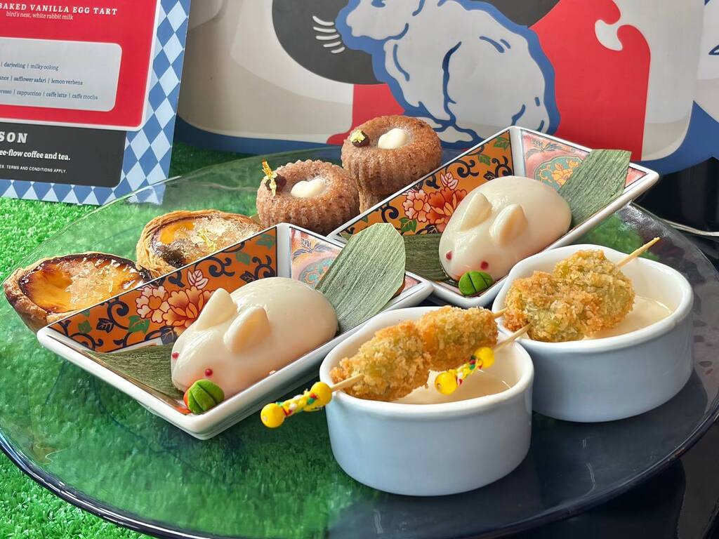 Financiers filled with yoghurt cream are topped with a delicate heart detail (top). Photo: Shannon Ong/HungryGoWhere westin white rabbit afternoon tea