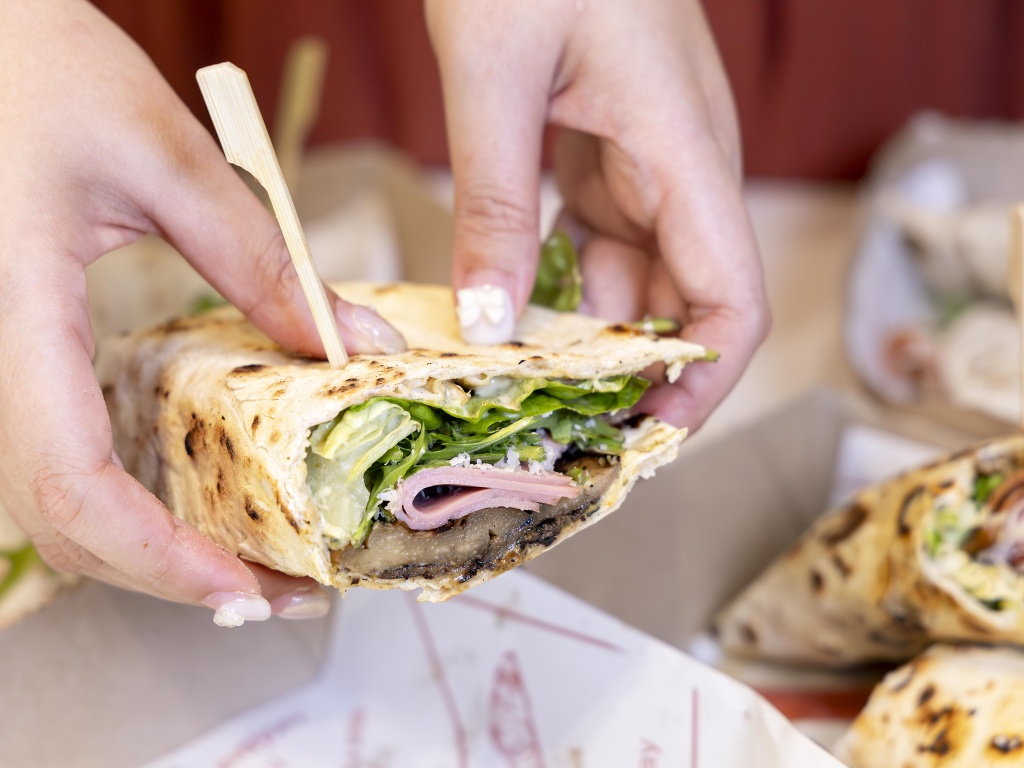 I had expected chunks of century egg sliced into the piadina, it was instead a pleasant, creamy century egg-stracciatella concoction. Photo: Koh Mui Fong/HungryGoWhere piadini italian streats somerset piadina singapore