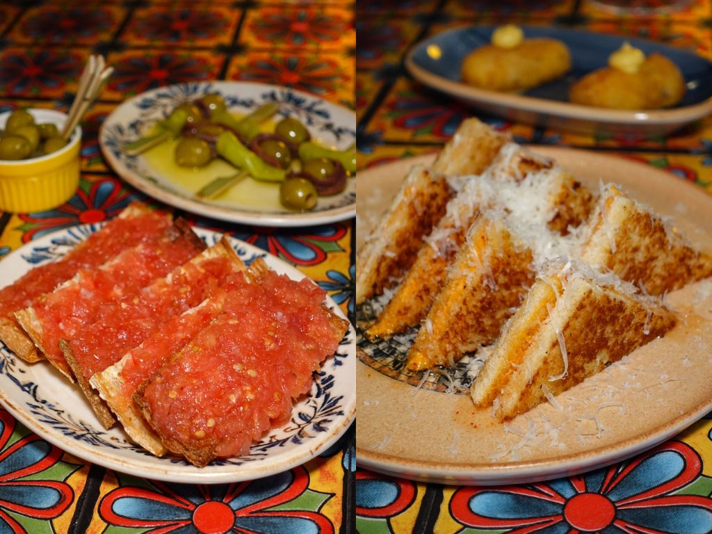 From left to right: Bread with tomatoes and the Bikini sobrasada with honey and cheese. Photo: Sarah Chua/HungryGoWhere new mar openings