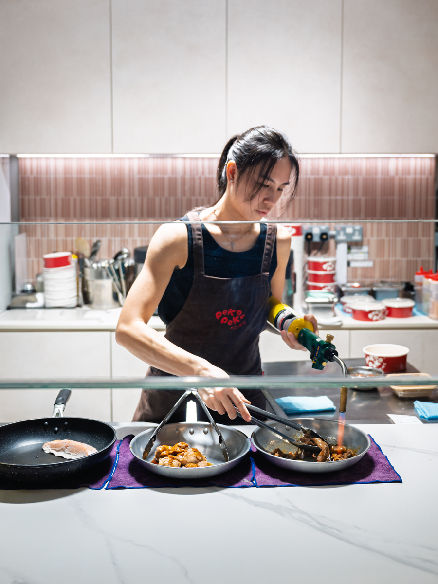 Desiree torches the proteins to order. Photo: Abdul Rahim Anwar/HungryGoWhere peko peko