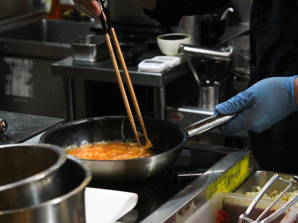 Careful technique goes into the scrambled eggs to achieve that consistent, silky texture. Photo: Angeline Ang/HungryGoWhere scrambled egg rice keisuke millenia walk