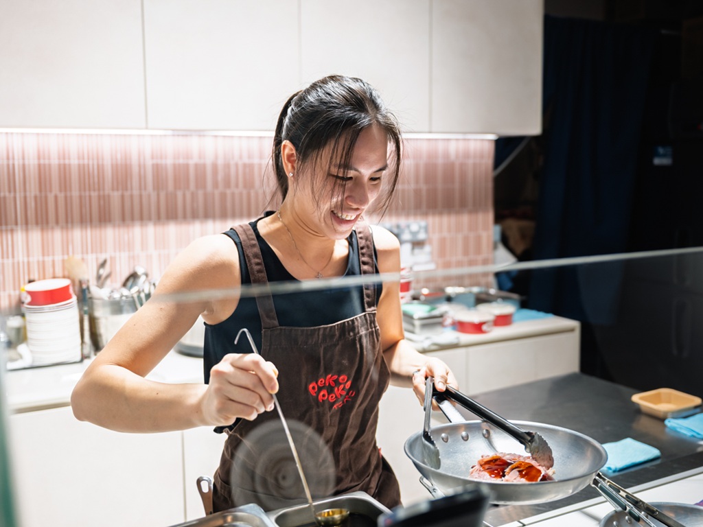 Desiree preparing the proteins. Photo: Abdul Rahim Anwar/HungryGoWhere peko peko