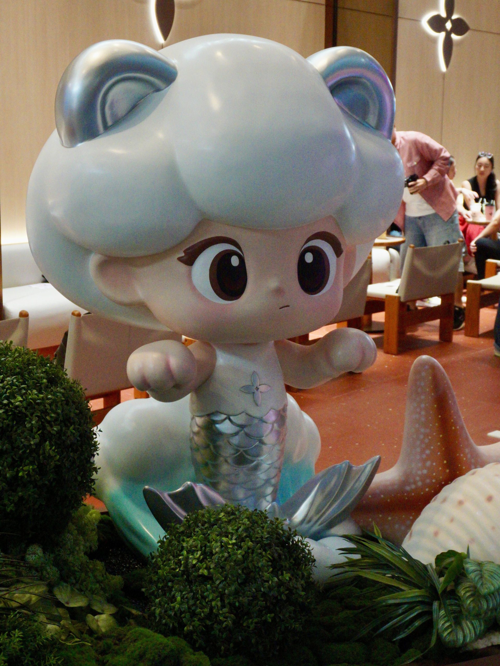 A Singapore exclusive: Molly Tea’s adorable mascot Molly in a merlion suit. Photo: Hannah Tan/HungryGoWhere molly tea