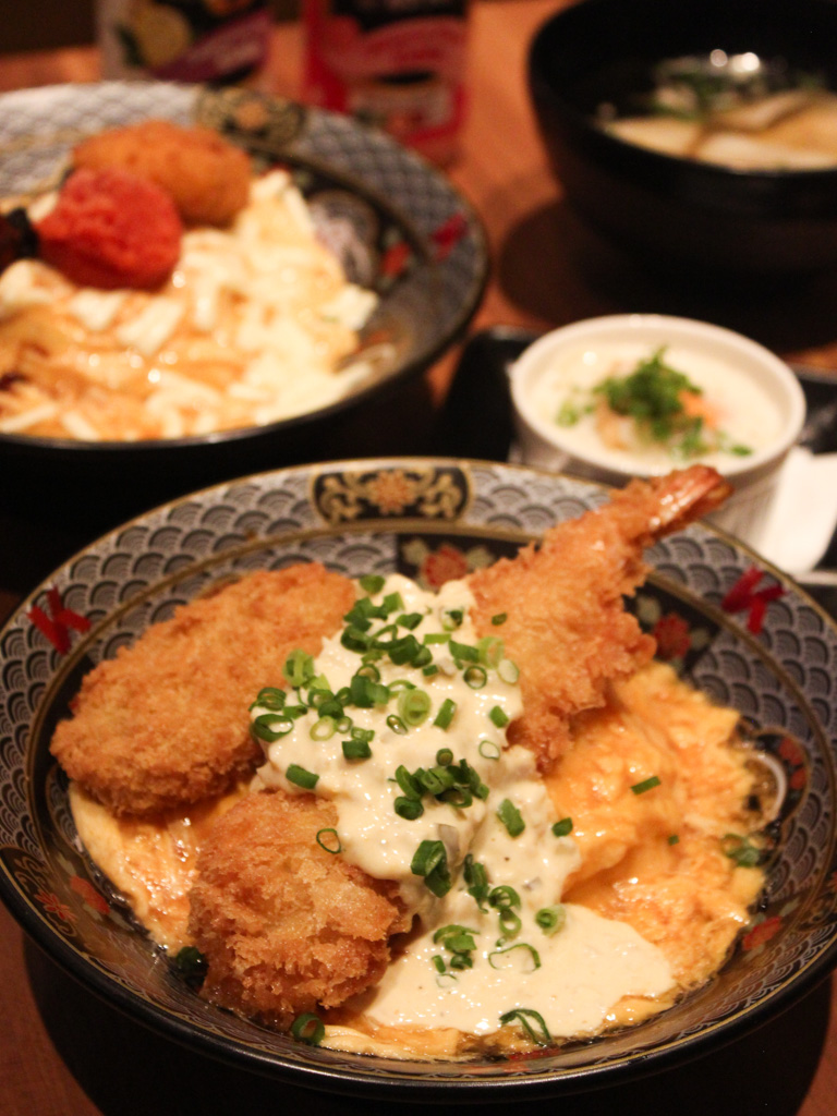 A small-sized bowl of egg rice with deep fried prawn with tar tar sauce and pumpkin croquette atop. Photo: Angeline Ang/HungryGoWhere scrambled egg rice keisuke millenia walk
