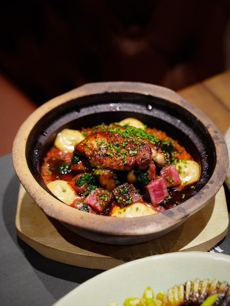 Foie gras in a claypot “paella”. Photo: Evan Mua/HungryGoWhere the margin restaurant