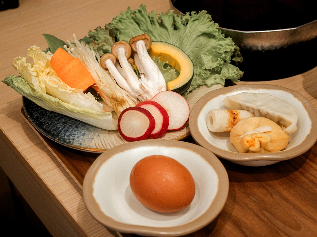 Clockwise, from top left: Yasai garden bowl, Three Treasures, and a pasteurised egg. Photo: Angeline Ang/HungryGoWhere shabu days bukit panjang