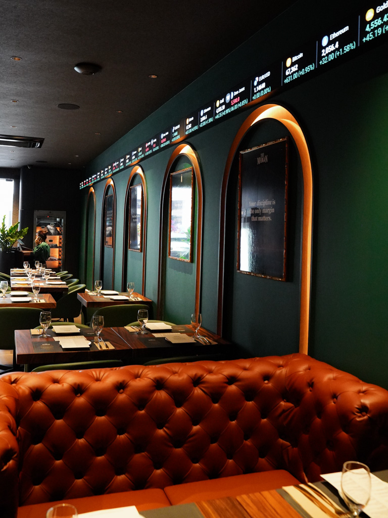 Rolling stock tickers along the walls are an interesting design touch. Photo: Evan Mua/HungryGoWhere the margin restaurant
