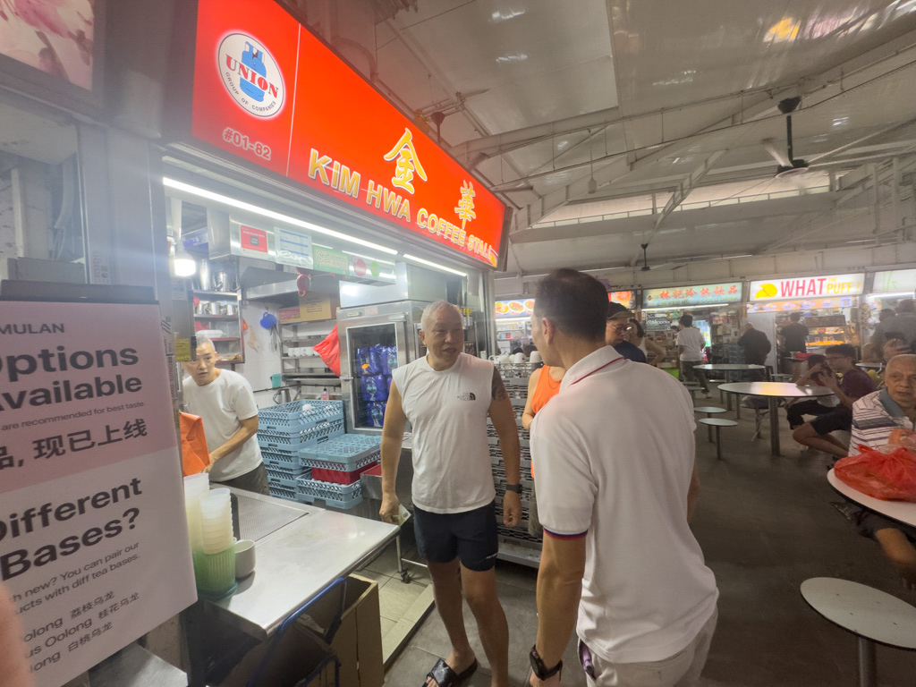 Tan Kiat How, Member of Parliament for Kampong Chai Chee, visiting the hawkers at 216 Bedok Food Centre and Market. Photo: Sng Ler Jun/HungryGoWhere 216 Bedok Food Centre and Market