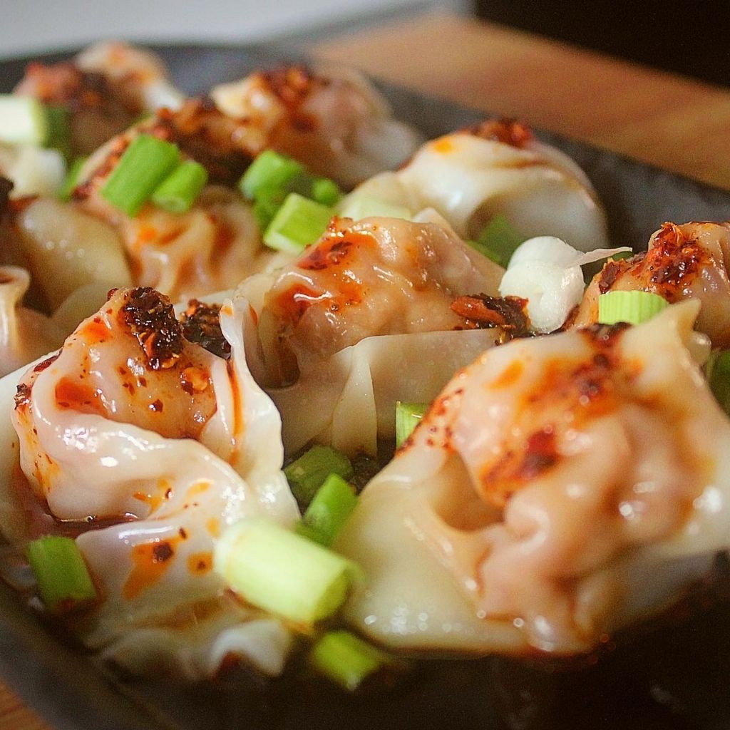 The wanton in chilli oil at Flourful Delight uses the same dough base, but it’s boiled and doused in chilli oil for a silky mouth feel. Photo: Flourful Delight/Instagram golden mile food centre