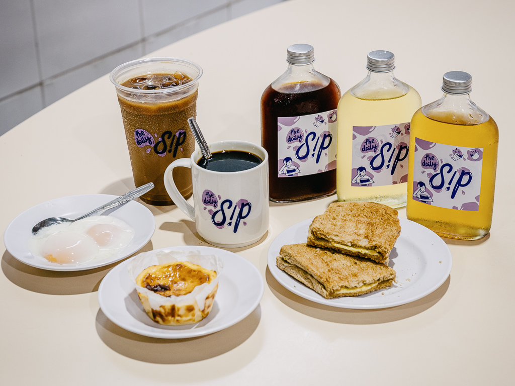 The Daily Sip’s cold brew bottles, cups and mugs adorned with their brand logo. Photo: Ravin Thiruchelvam/HungryGoWhere the daily sip