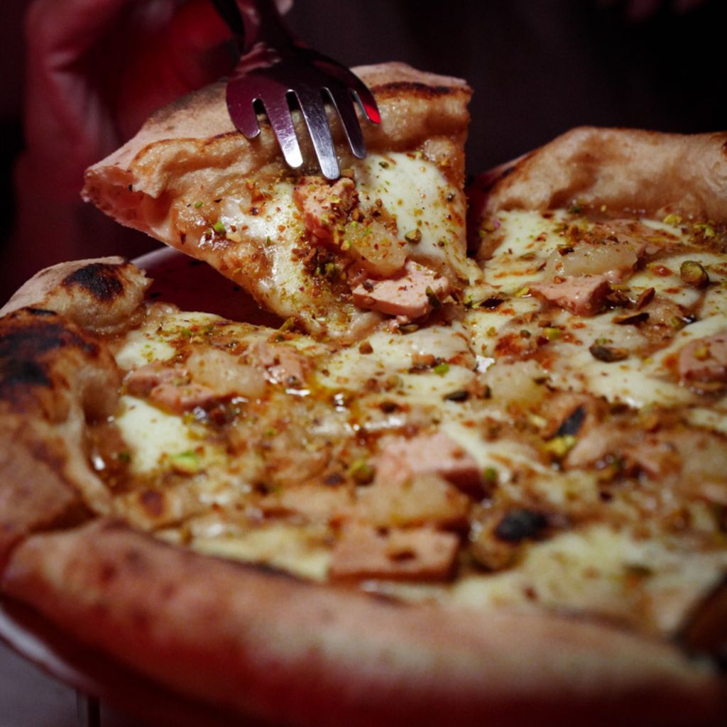 The foie gras pate pizza. Photo: Evan Mua/HungryGoWhere new june openings