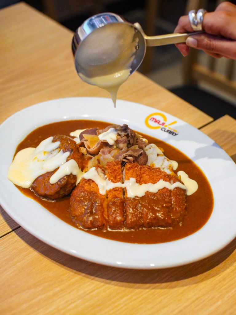 Triple meat, with added cheese sauce. Photo: Evan Mua/HungryGoWhere Funan Mall food