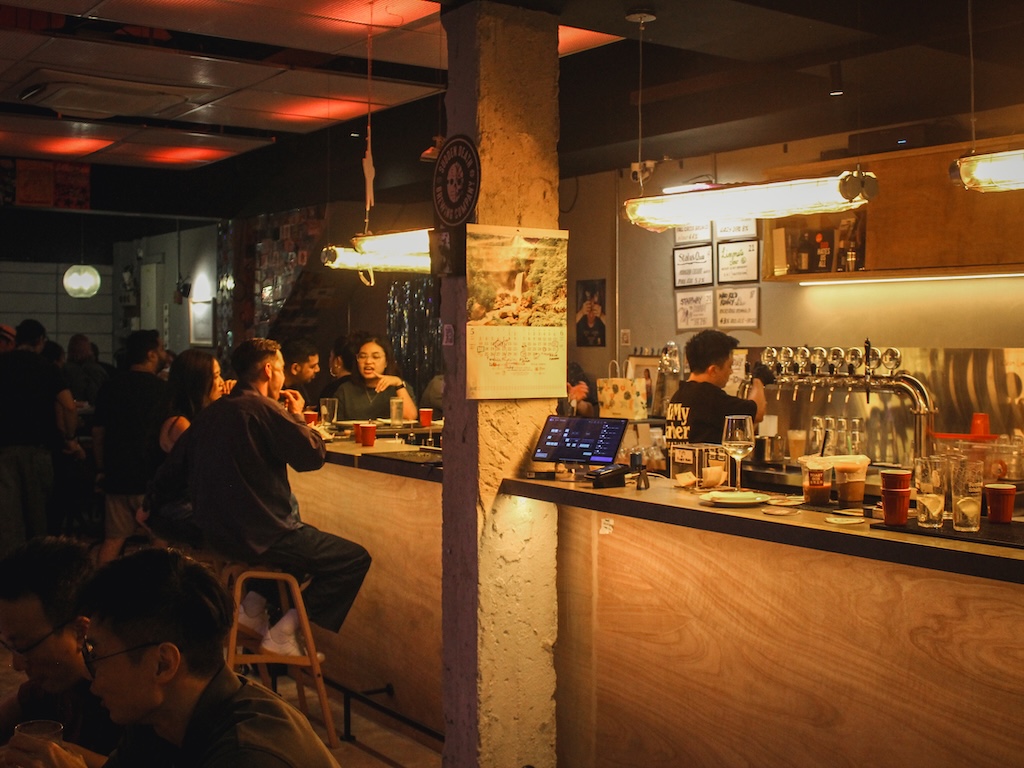 You’ll find the current rotation of beers on tap plastered on the wall behind the bar. Photo: Angeline Ang/HungryGoWhere second thoughts jalan besar