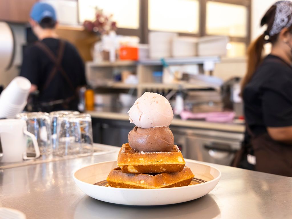 Scoops of ice cream on waffles. Photo: Koh Mui Fong/HungryGoWhere creamier ice cream singapore