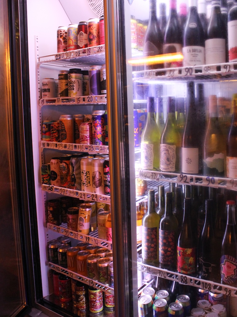 The fridge is stocked with a colourful range of canned craft beers, alongside some bottles of wine. Photo: Angeline Ang/HungryGoWhere second thoughts jalan besar