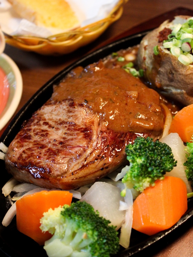 We went with the rosemary onion sauce for our NZ ribeye steak. Photo: Angeline Ang/HungryGoWhere Tim's Restaurant And Cafe