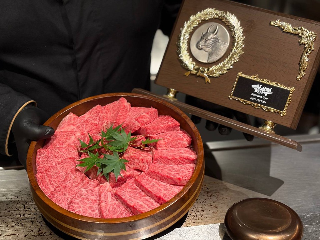 The beautifully marbled A5 Japanese wagyu, ready for grilling. Photo: Shannon Ong/HungryGoWhere kou teppan omakase singapore
