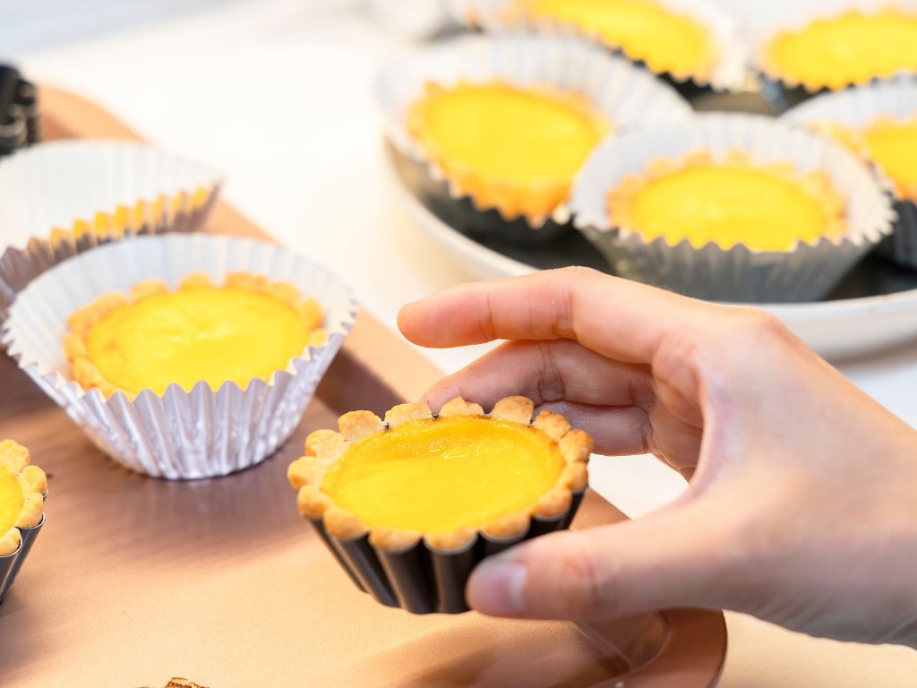 Hong Kong-style egg tarts baked by Kwang Yu’s wife Alison. Photo: Koh Mui Fong/HungryGoWhere bartley brewers