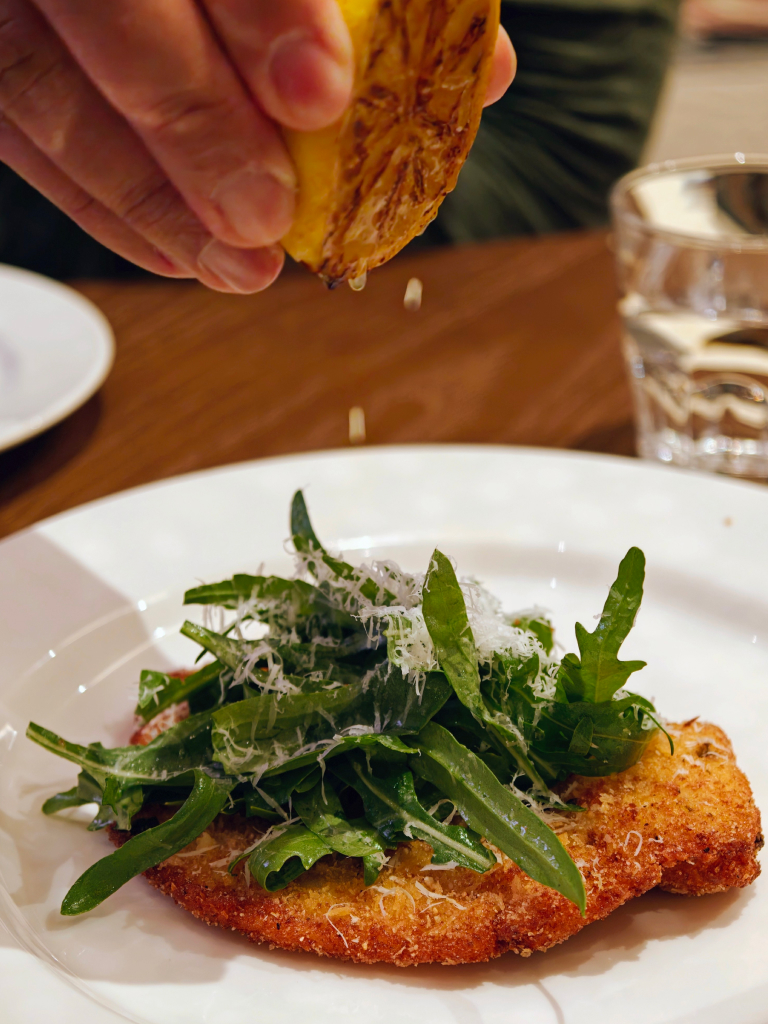 Parmesan and caper chicken schnitzel. Photo: Zawani Abdul Ghani/HungryGoWhere centro