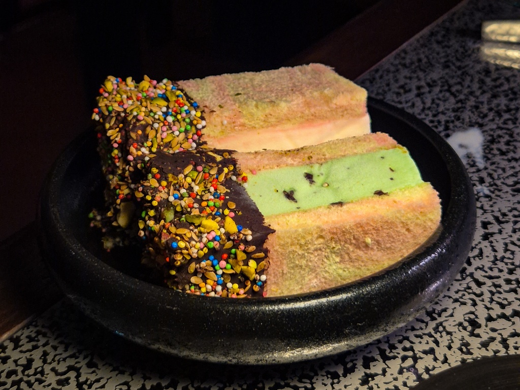 Ice-cream sandwich with raspberry swirl and pistachio ice cream. Photo: Sarah Chua/HungryGoWhere Bar Kap Singapore