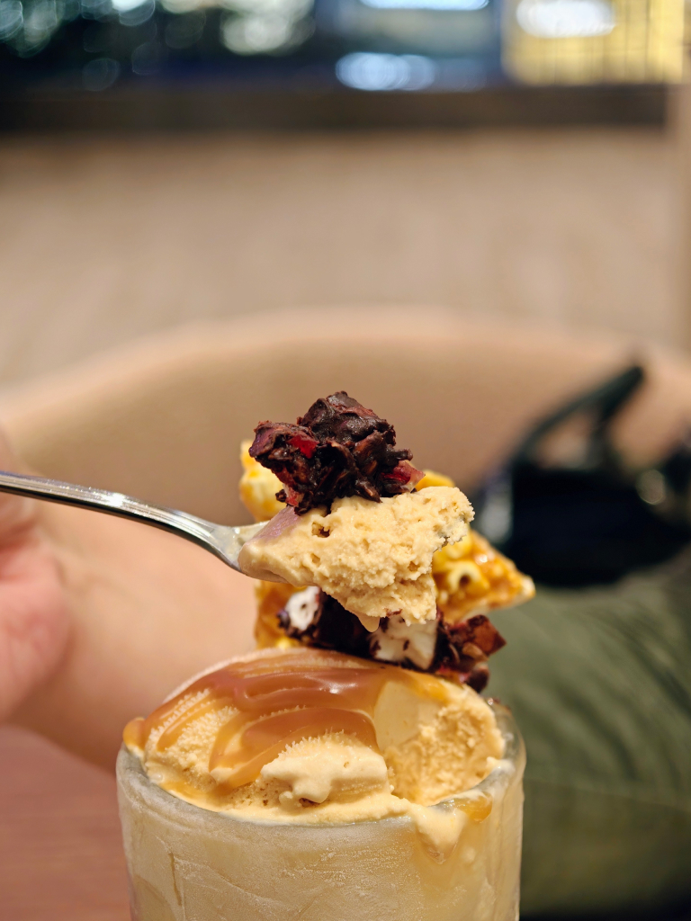 You have to do a bit of fishing to get all the elements of the popcorn sundae on the spoon. Photo: Zawani Abdul Ghani/HungryGoWhere centro