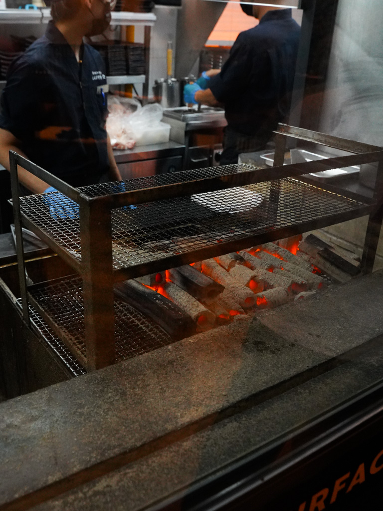 You can see them charcoal grilling in real time. Photo: Evan Mua/HungryGoWhere charcoal grill shinpachi singapore-