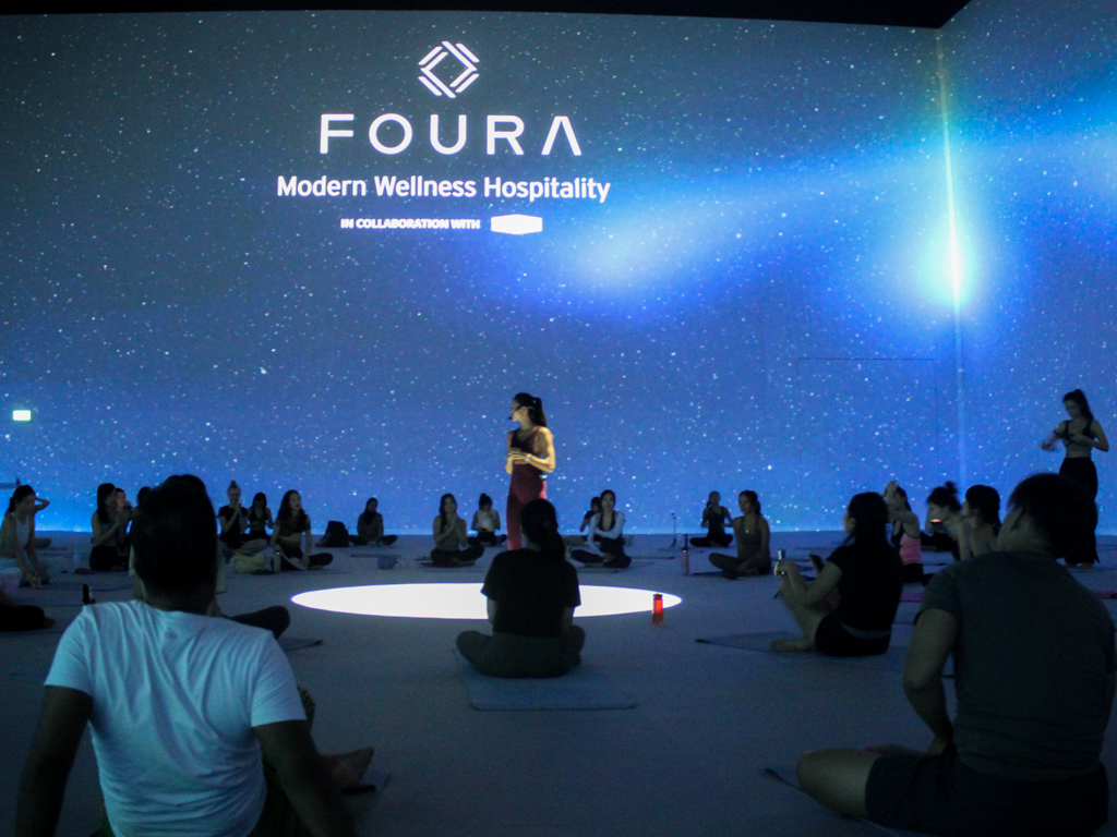 An immersive yoga session held at IMBA Theatre. Photo: Angeline Ang/HungryGoWhere foura gardens by the bay