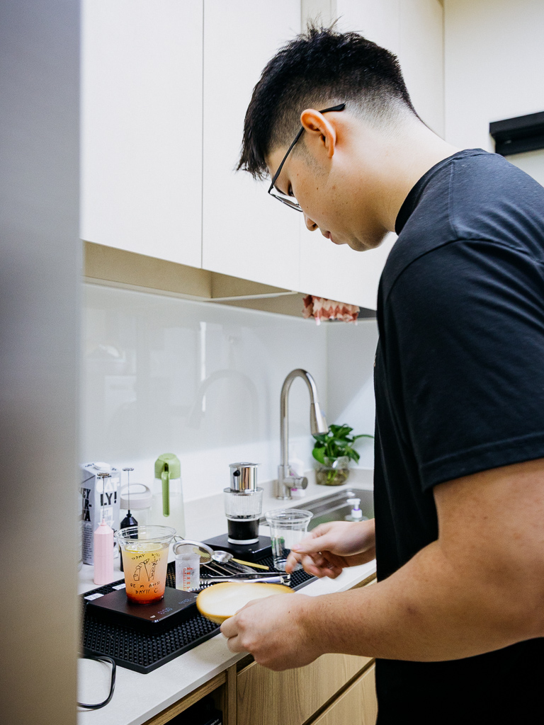 Jonathan prepares drinks in the kitchen. Photo: Ravin Thiruchelvam/HungryGoWhere cafe smiggie