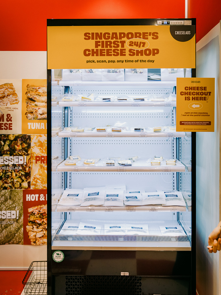 The trio says the concept — selling artisanal cheese at a petrol kiosk — is the first of its kind in Singapore. Photo: Ravin Thiruchelvam/HungryGoWhere pressed by cheeselads