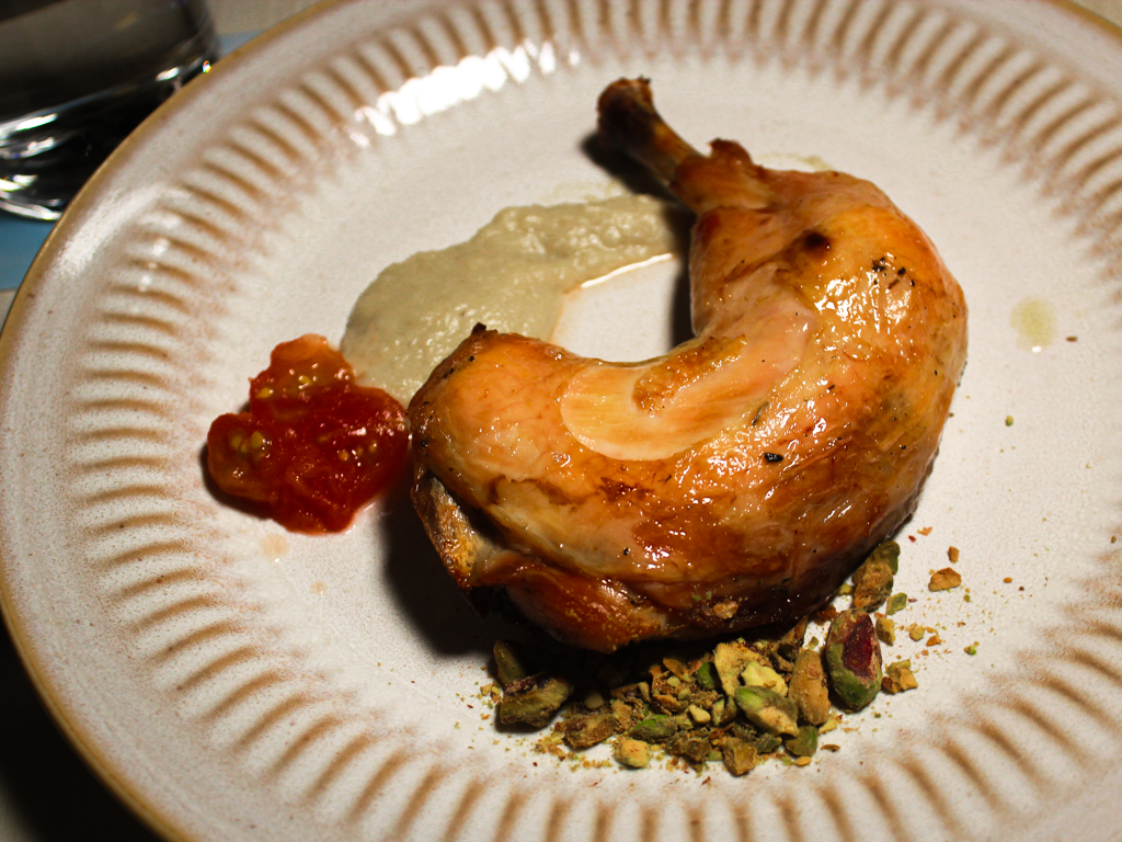 Herb confit chicken leg. Photo: Angeline Ang/HungryGoWhere foura gardens by the bay