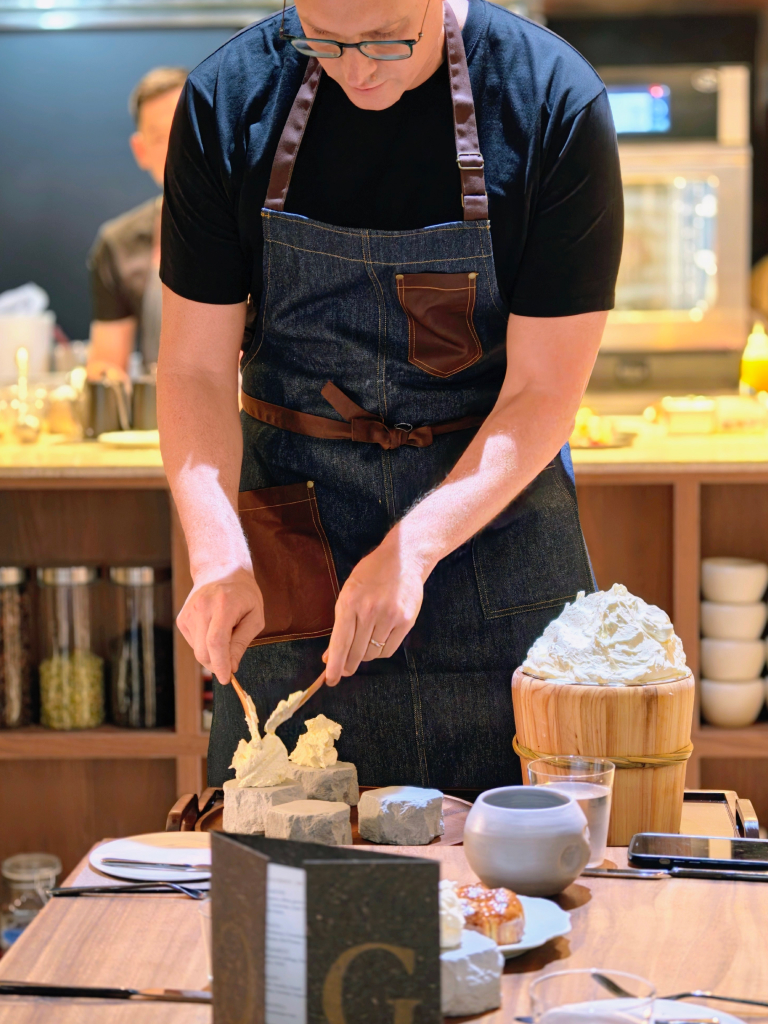 Chef Denis Lucchi portioning the whipped butter tableside. Photo: Zawani Abdul Ghani/HungryGoWhere assagi